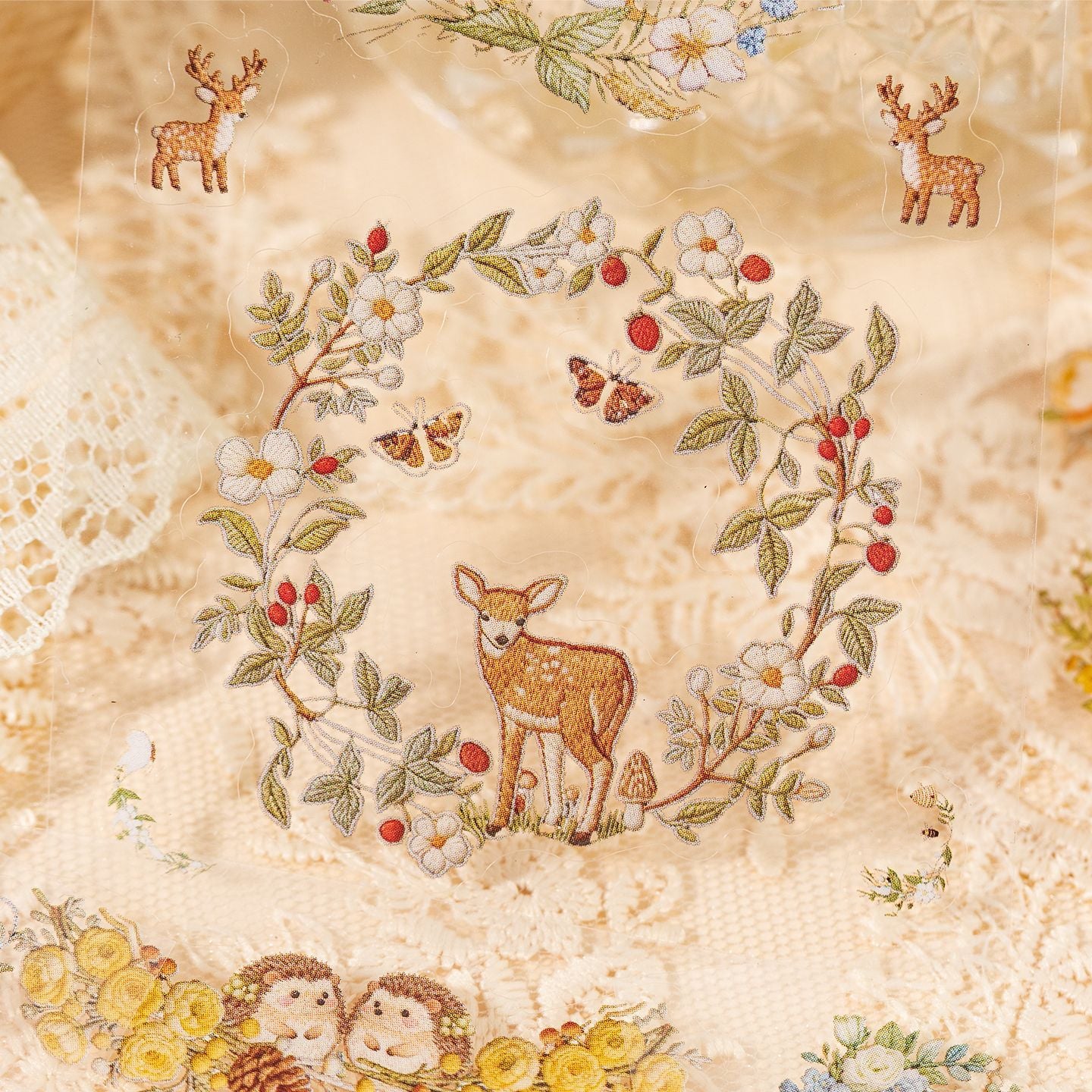 Floral embroidery frame sticker book with botanical borders, wreaths, rabbits, butterflies, ribbons, and photo frame designs