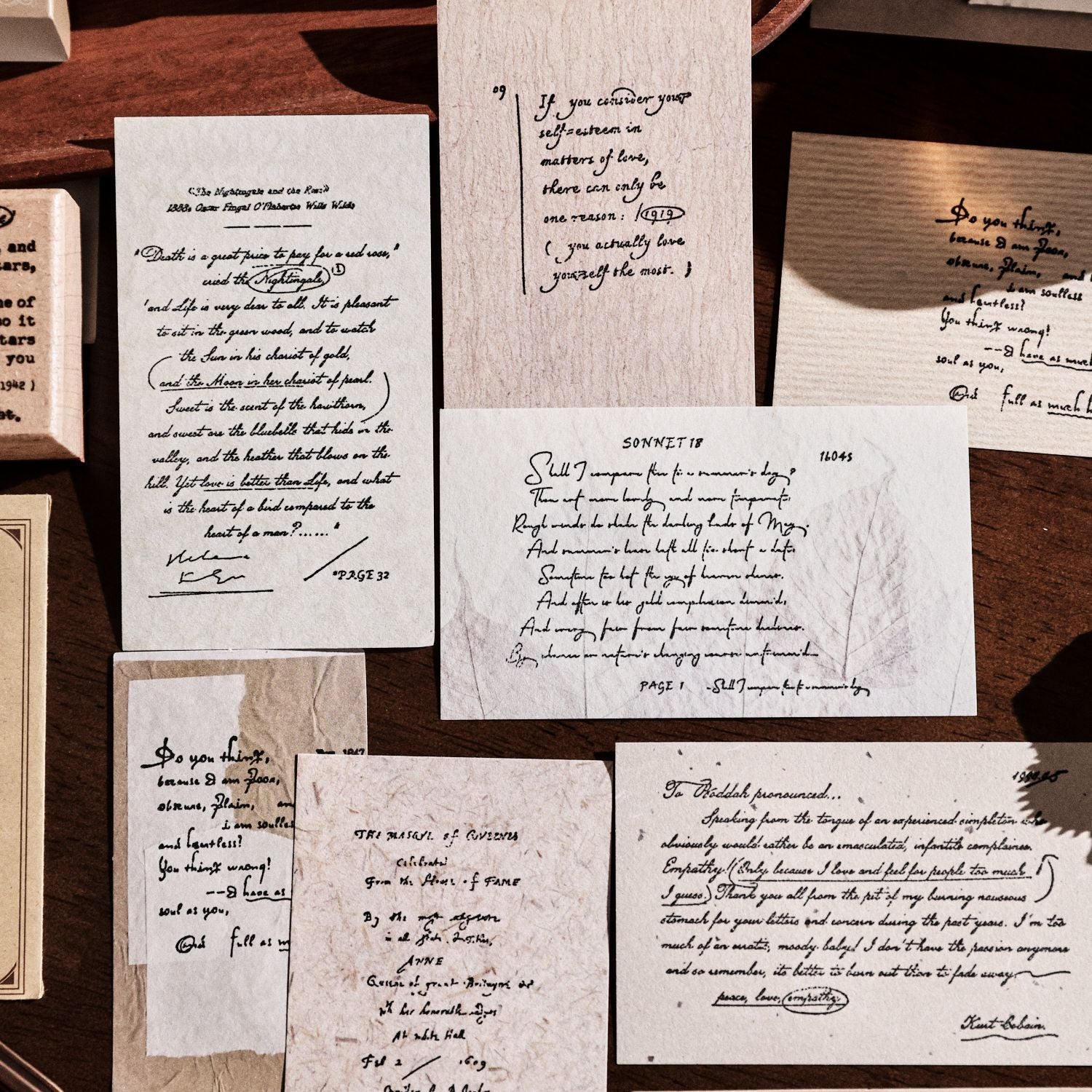 Vintage wooden stamp set with literary text designs