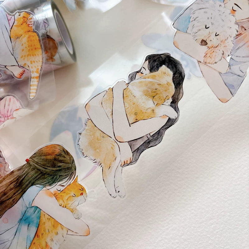 Detail of watercolor girls hugging cats and dogs illustrations on tape