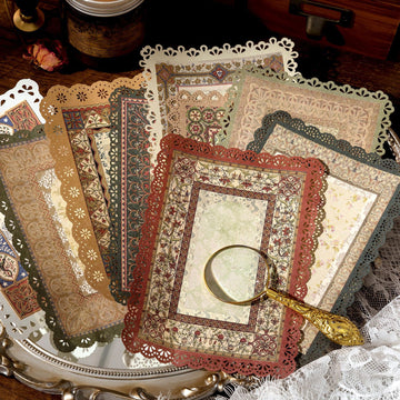 Vintage lace-edge scrapbooking paper design featuring antique lace borders and aged book-page texture
