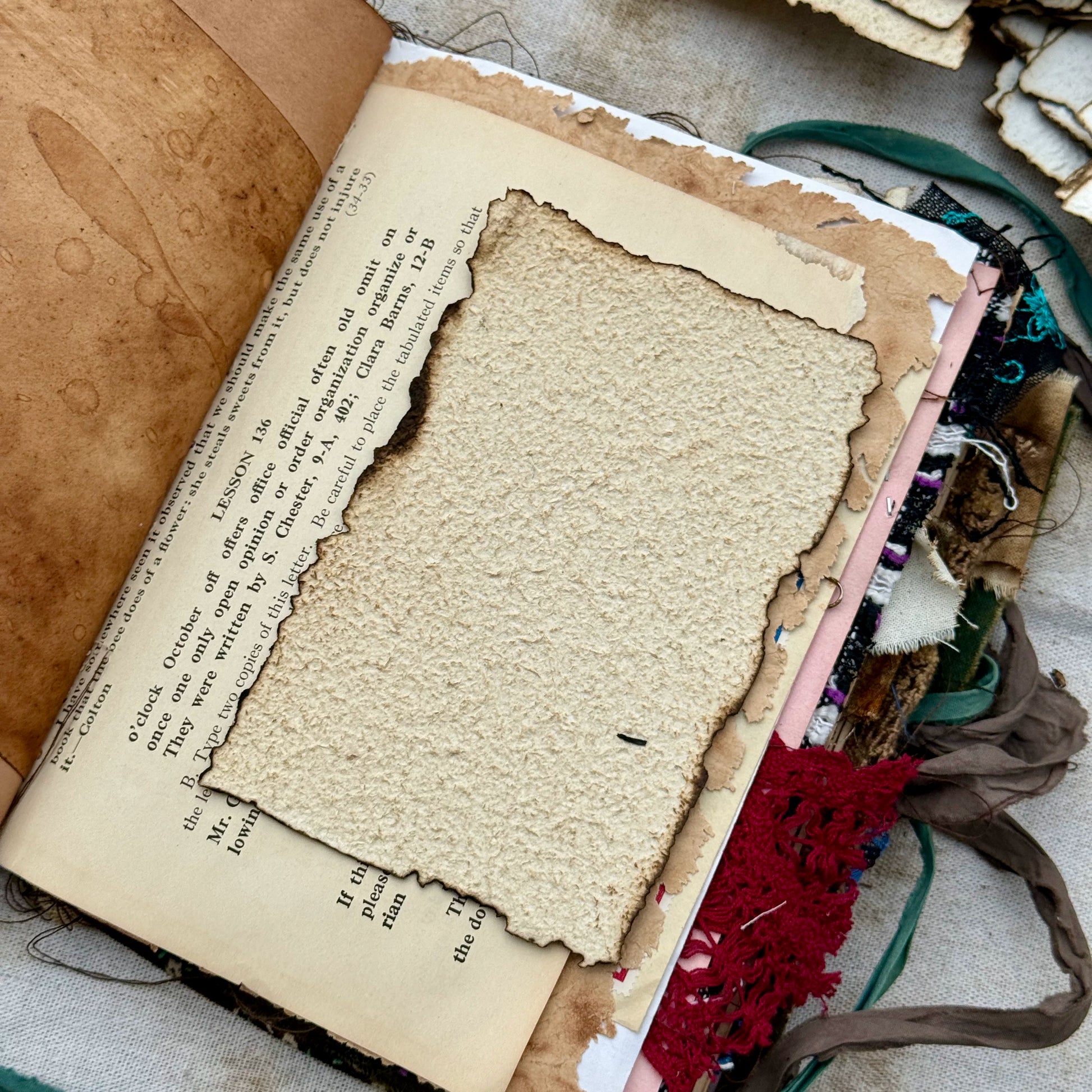 Vintage burnt edge handmade scrapbooking paper with aged neutral sheets