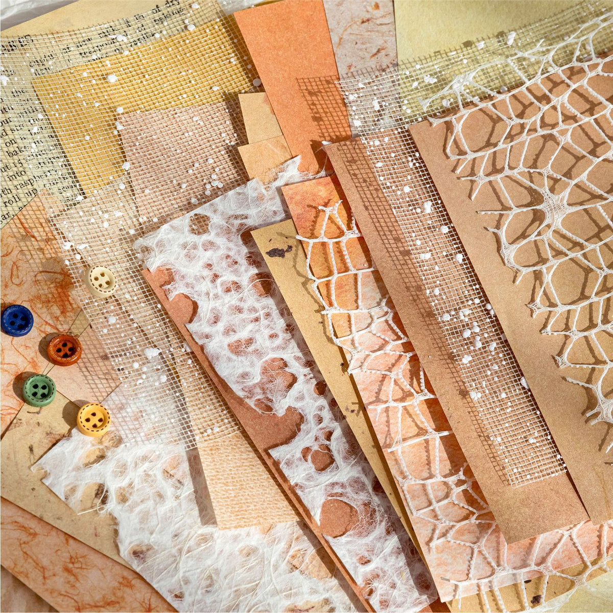 Mixed-texture pastel scrapbooking paper with romantic lace mesh overlay pattern