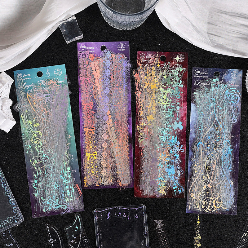 Dark holographic lace border sticker strips with color-shifting glow effect for night aesthetic journaling