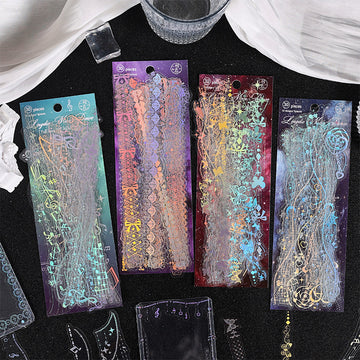 Dark holographic lace border sticker strips with color-shifting glow effect for night aesthetic journaling
