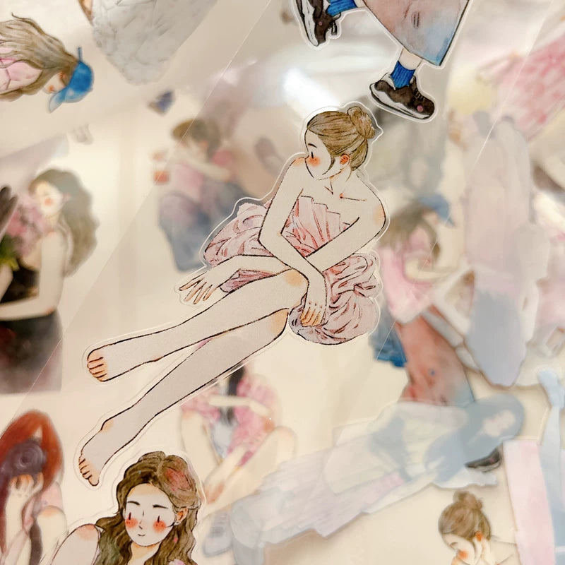 Die-cut blush pink girls tape pieces layered on white paper