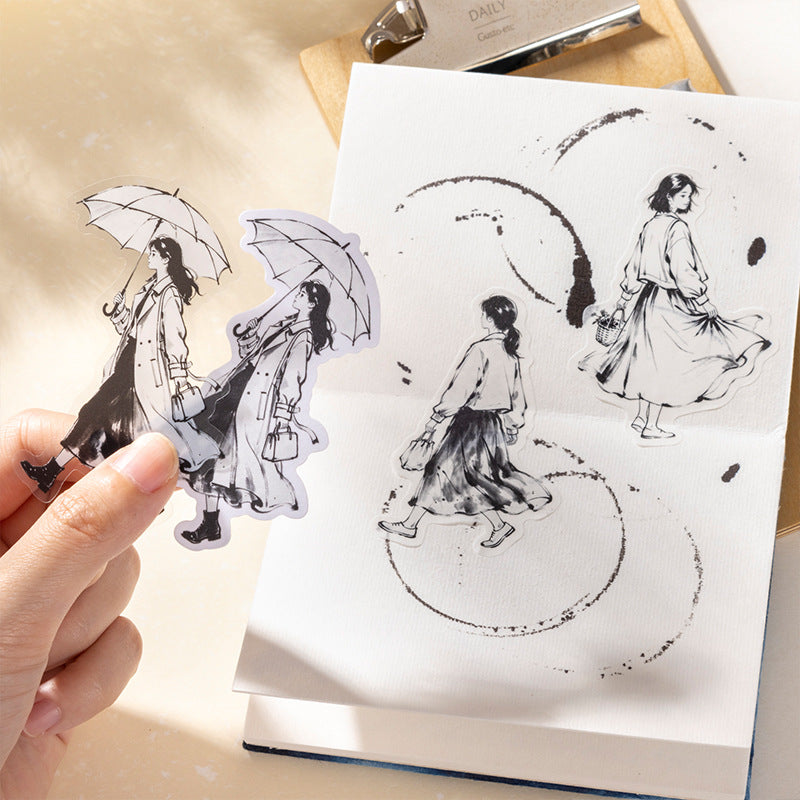Minimalist ink-wash floral sticker design in soft monochrome tones