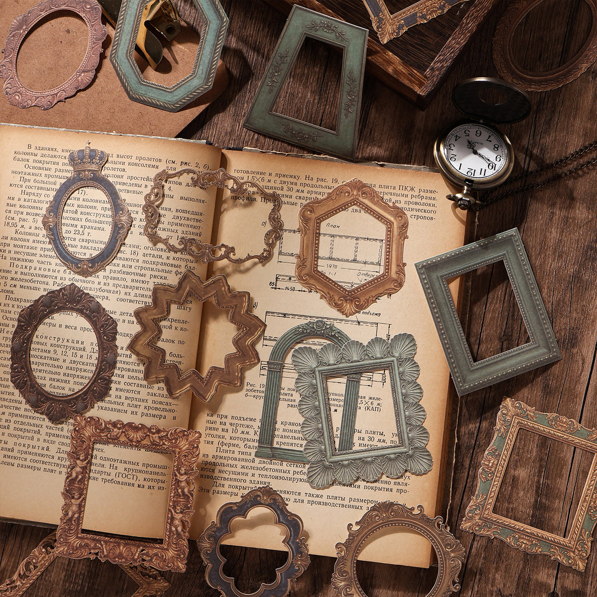 Vintage ornate frame stickers in green, gold and bronze scattered over an open old book