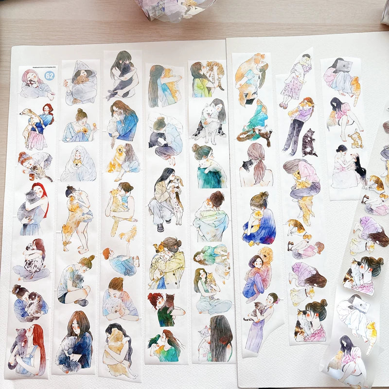 Pet cuddles tape strips laid out on paper