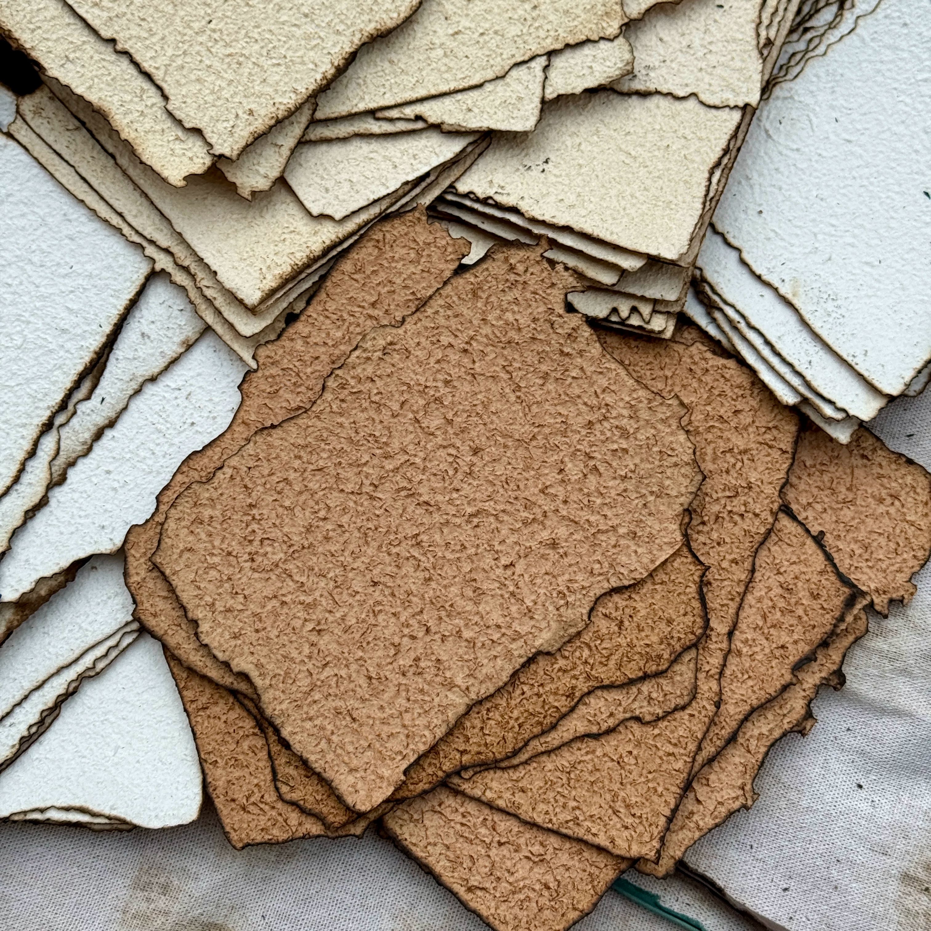 Vintage burnt edge handmade scrapbooking paper with aged neutral sheets