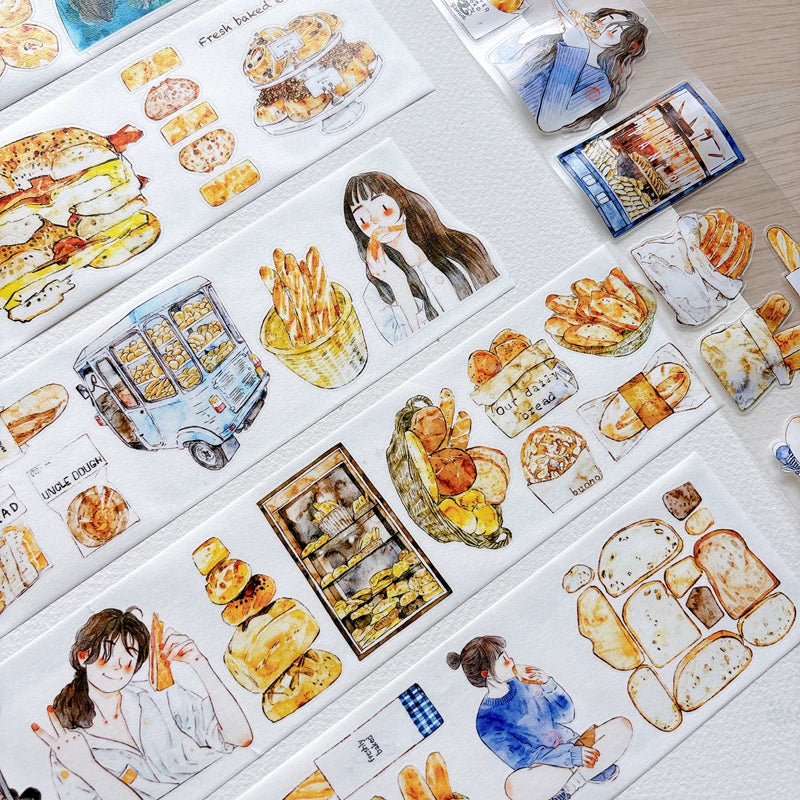 Close-up of die-cut bakery girls and bread tape