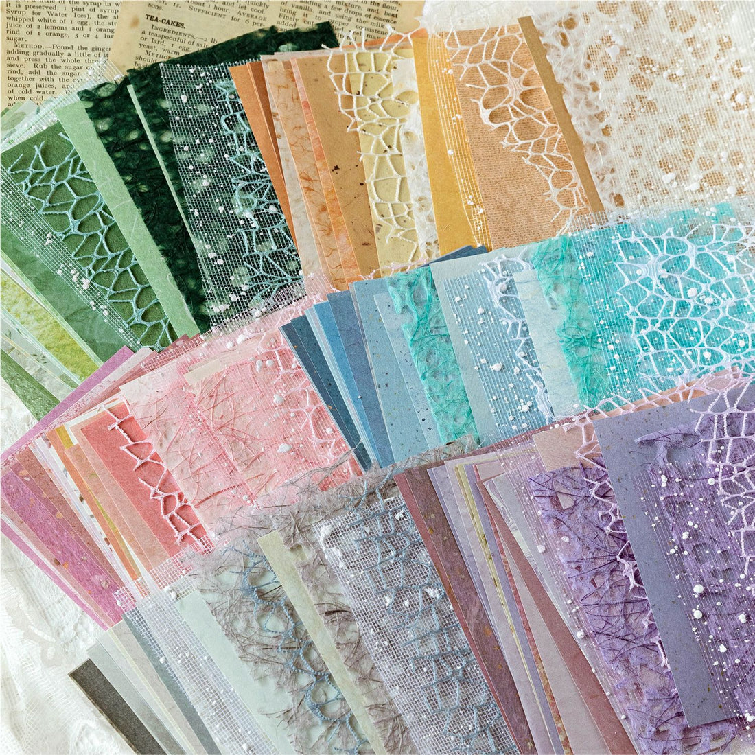 Mixed-texture pastel scrapbooking paper with romantic lace mesh overlay pattern