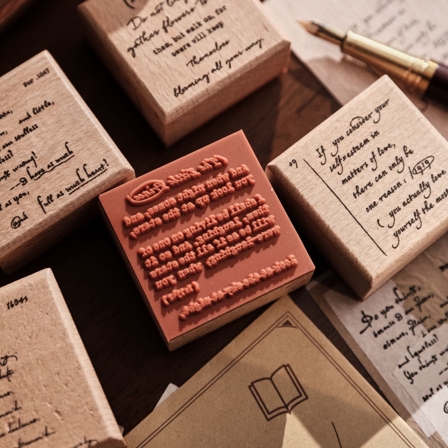 Vintage wooden stamp set with literary text designs
