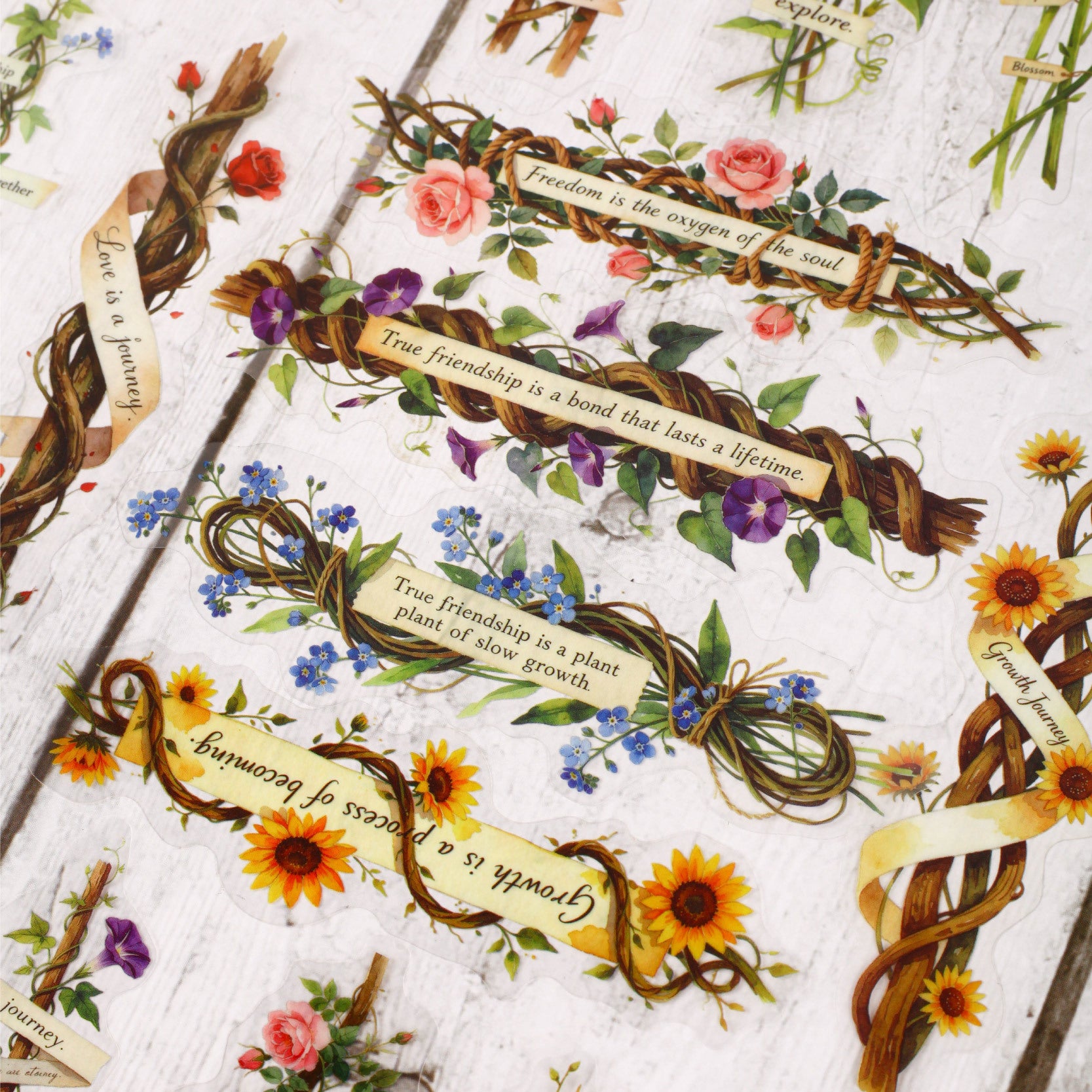 Vintage floral sticker pack close-up with sunflowers, roses, ribbons, and botanical labels