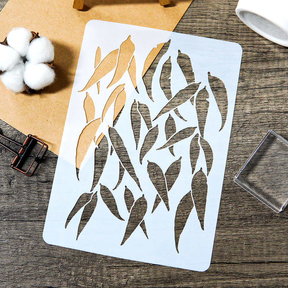 Monstera PET stencil template with leaf cutout pattern