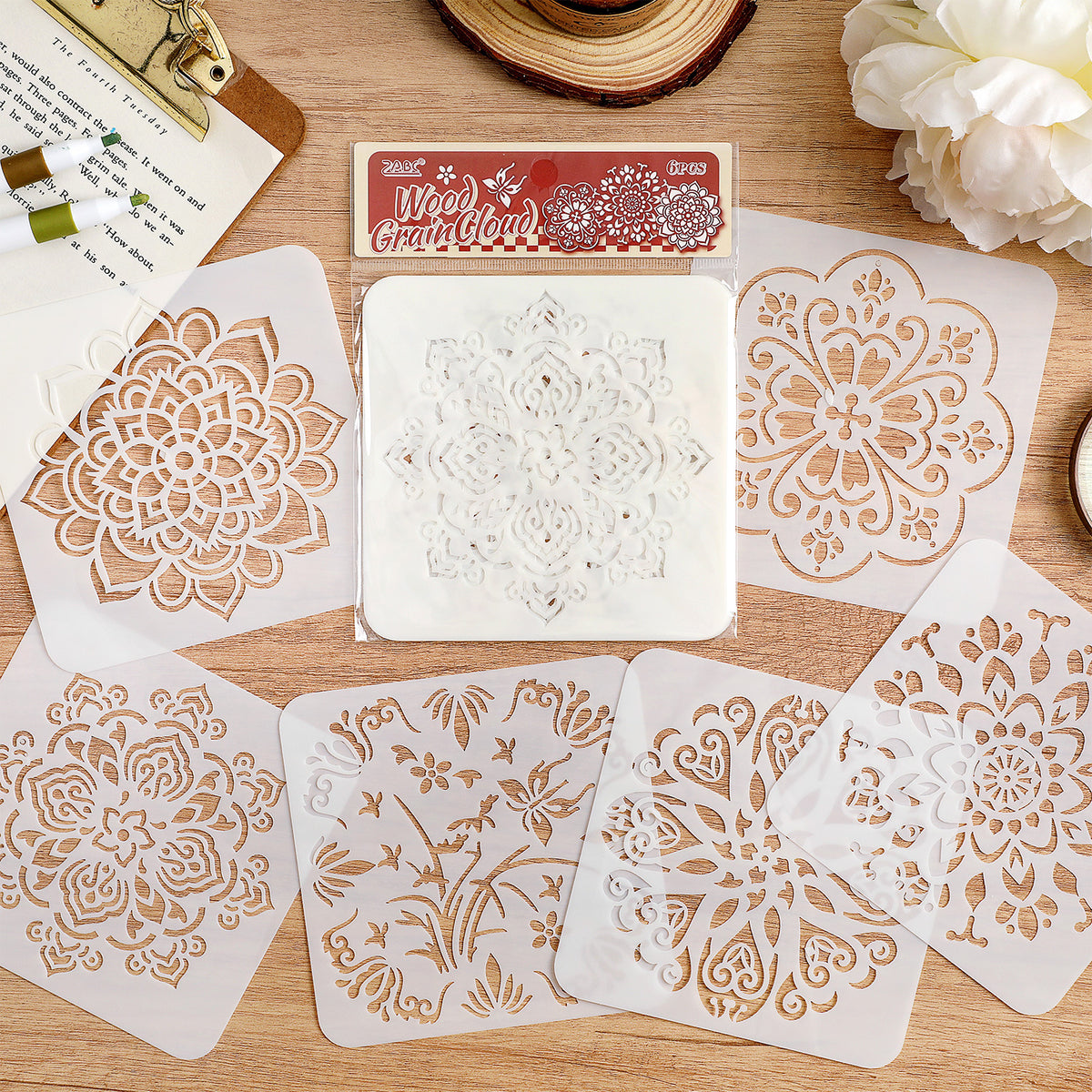 Mandala stencils with a packaged set and white flowers
