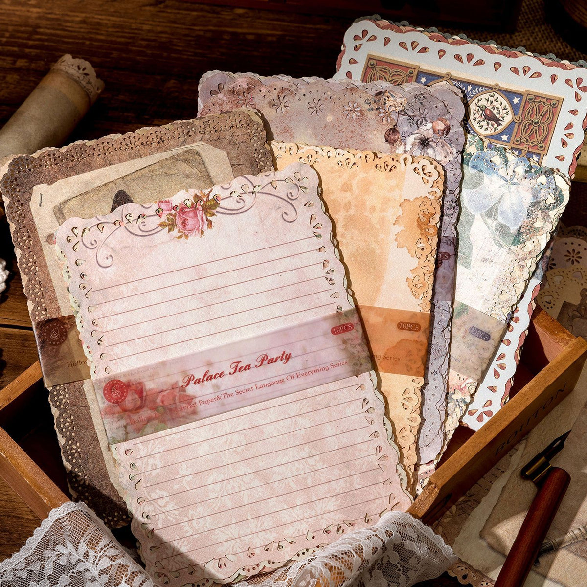 Vintage lace-edge scrapbooking paper design featuring antique lace borders and aged book-page texture