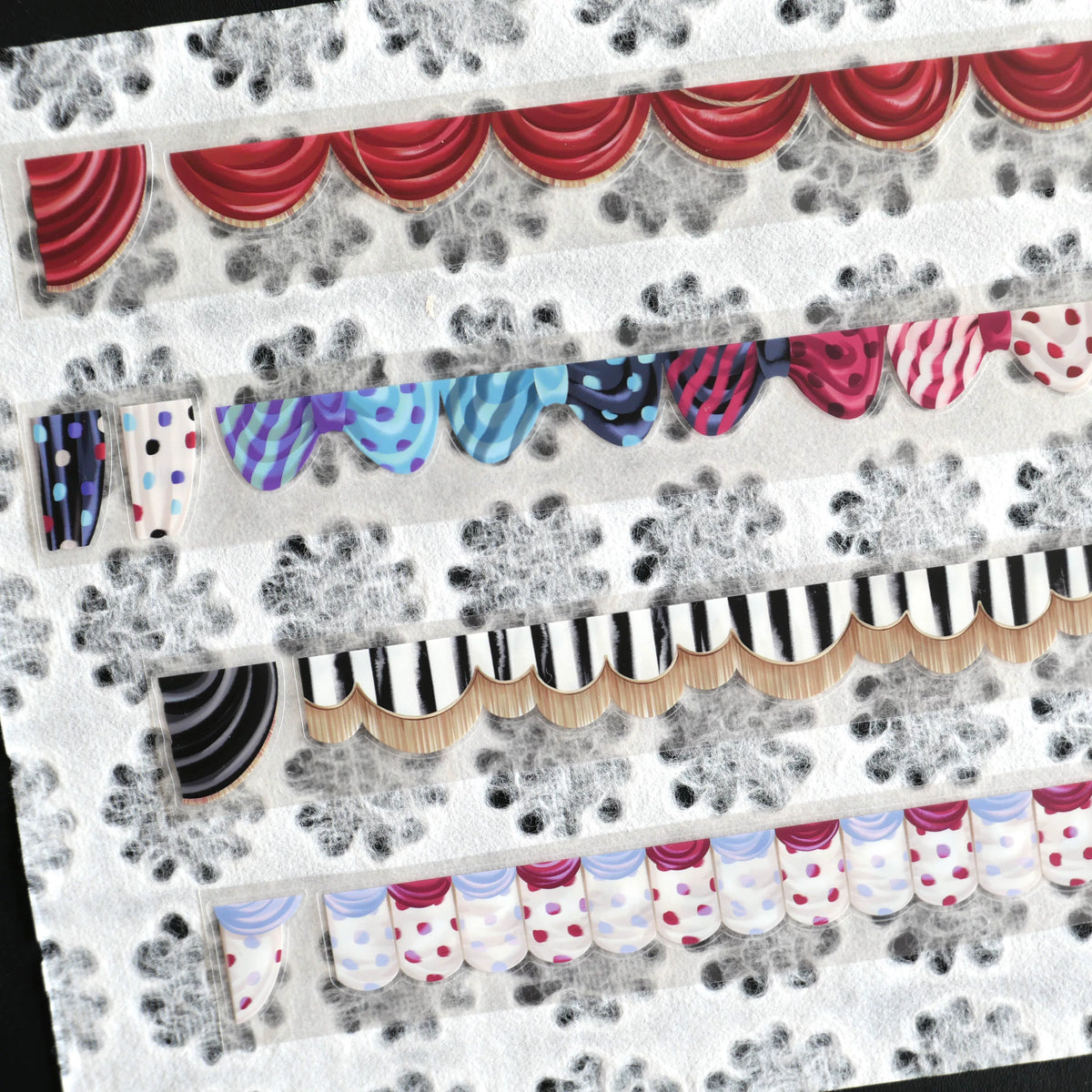Curtain collector tape strips on a textured floral background