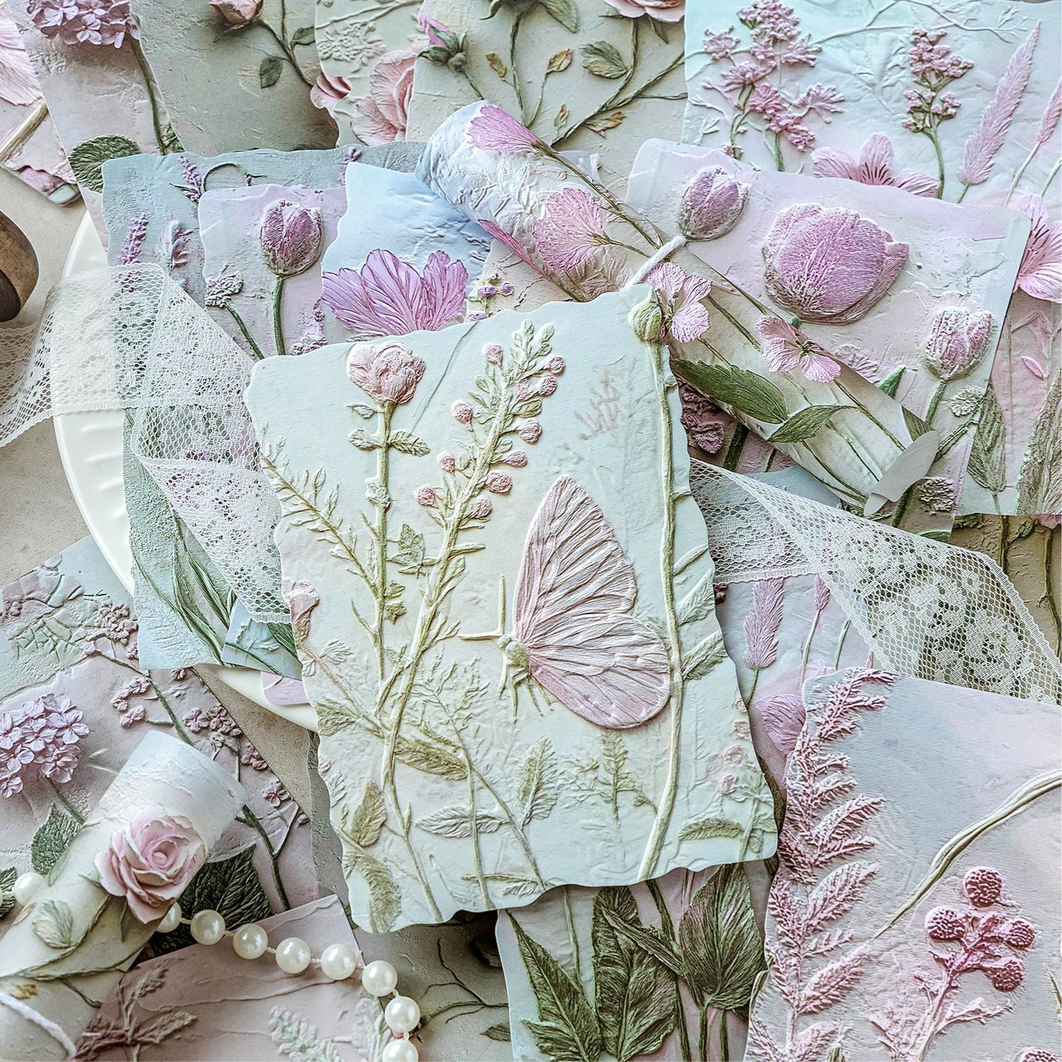 Vintage botanical relief scrapbooking paper with flower and leaf textures