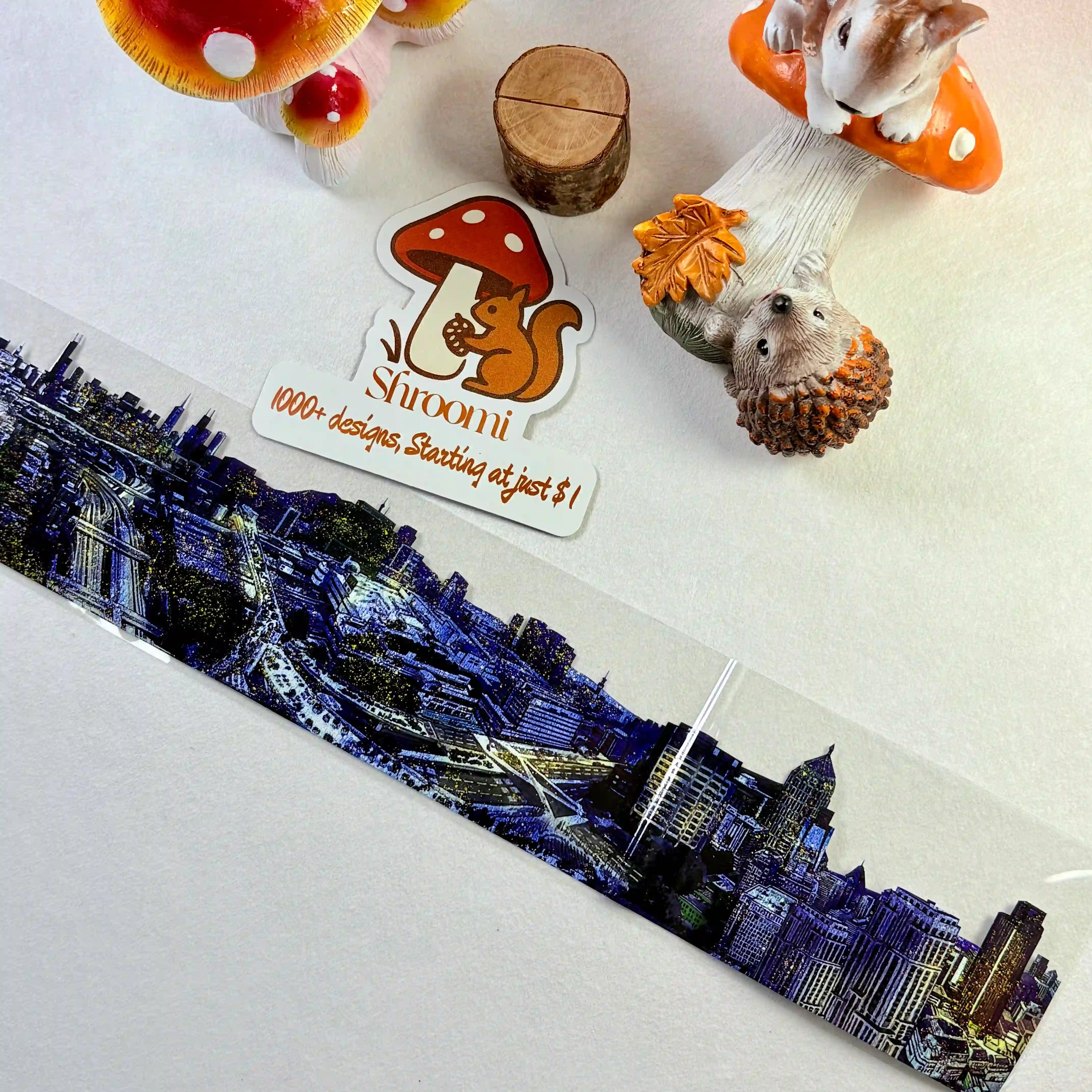 Loop 1 – PET tape showing night cityscape fragment over illustrated background