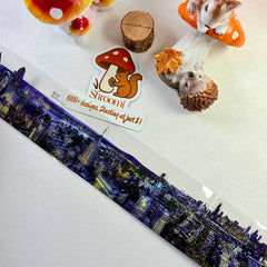 Loop 2 – PET tape showing night cityscape fragment over illustrated background