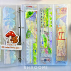 Handy washi tape storage album with pocket-style pages for organizing pre-cut tape pieces and stickers effortlessly.