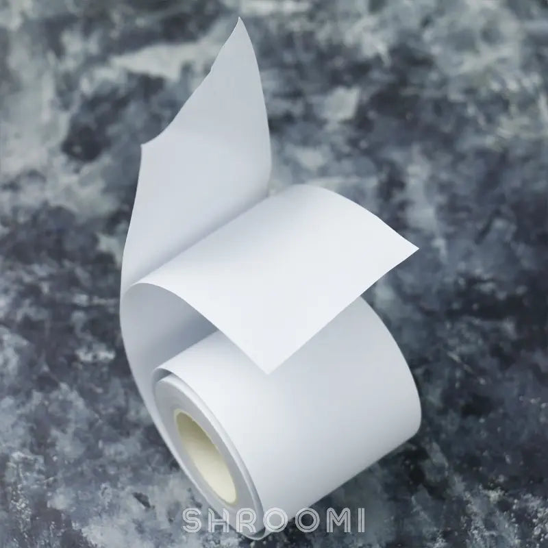 White base tape with release paper, showcasing a clean, smooth texture and a protective backing for easy application.
