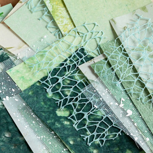 Mixed-texture pastel scrapbooking paper with romantic lace mesh overlay pattern