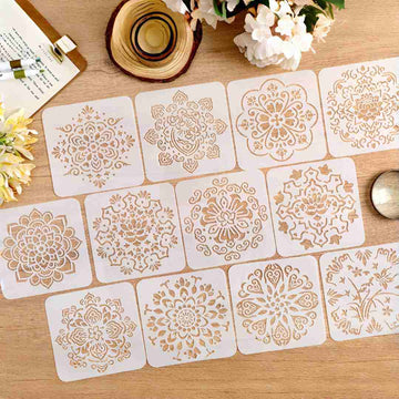 Twelve square mandala drawing stencils laid out on a wooden desk
