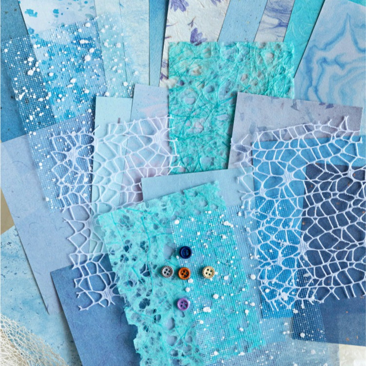 Mixed-texture pastel scrapbooking paper with romantic lace mesh overlay pattern