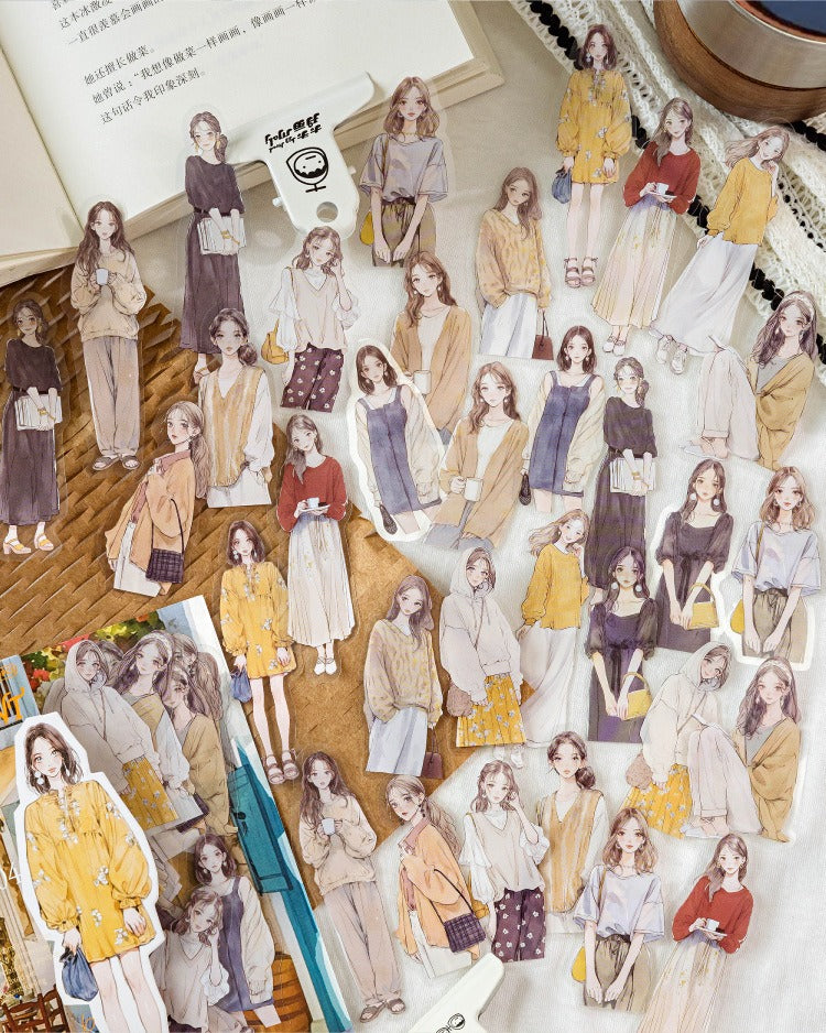 An array of die-cut stickers depicting fashionable women in casual wear, perfect for creative journaling, from Shroomi.