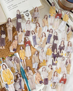 An array of die-cut stickers depicting fashionable women in casual wear, perfect for creative journaling, from Shroomi.