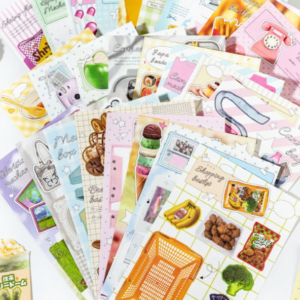 Fragments scrapbook kit with no-cut food pieces, daily notes, photo layouts, memory book cards, and handmade paper scenes