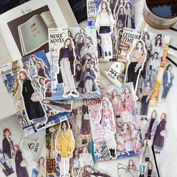Aesthetic Shroomi fashion girl paper doll stickers for journaling and scrapbooking, arranged with a notebook and coffee.
