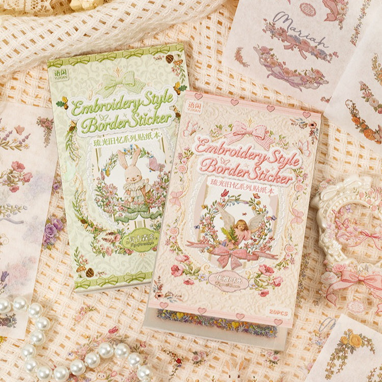 Floral embroidery frame sticker book with botanical borders, wreaths, rabbits, butterflies, ribbons, and photo frame designs