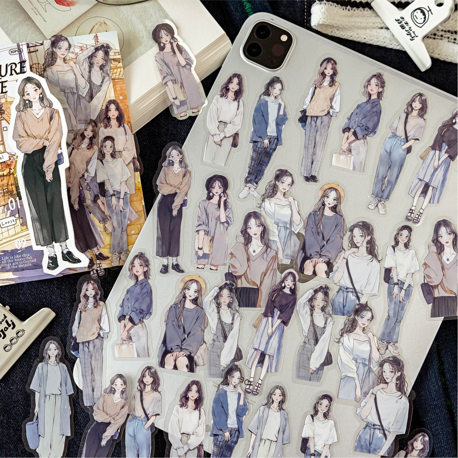 A large collection of translucent fashion girl stickers for journaling, with a matching sticker book, by Shroomi.