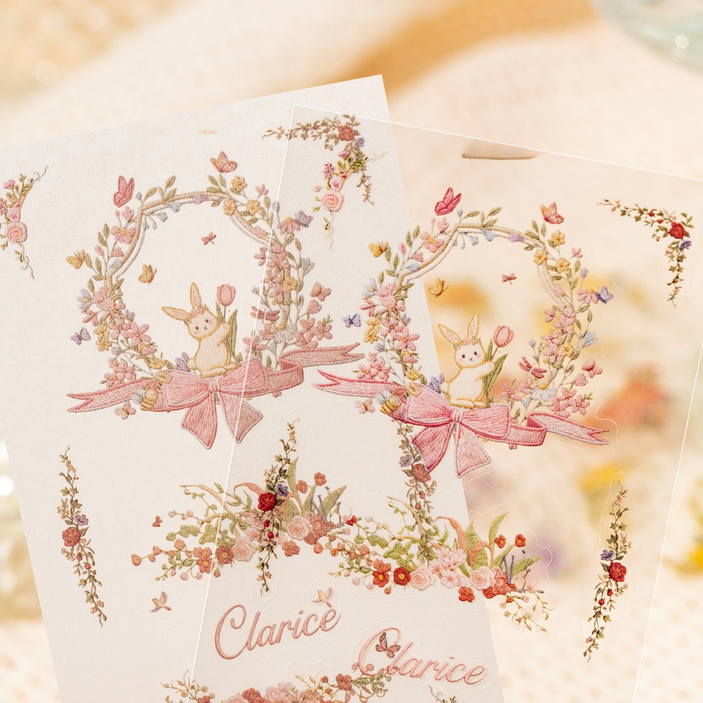Floral embroidery frame sticker book with botanical borders, wreaths, rabbits, butterflies, ribbons, and photo frame designs