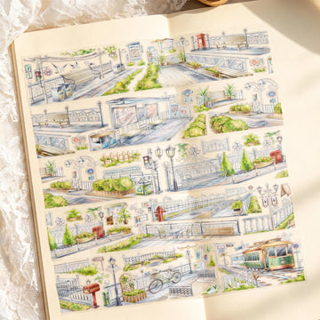 Watercolor PET tape artwork with sunlit roads, railings, benches, greenery, street signs, and a green tram