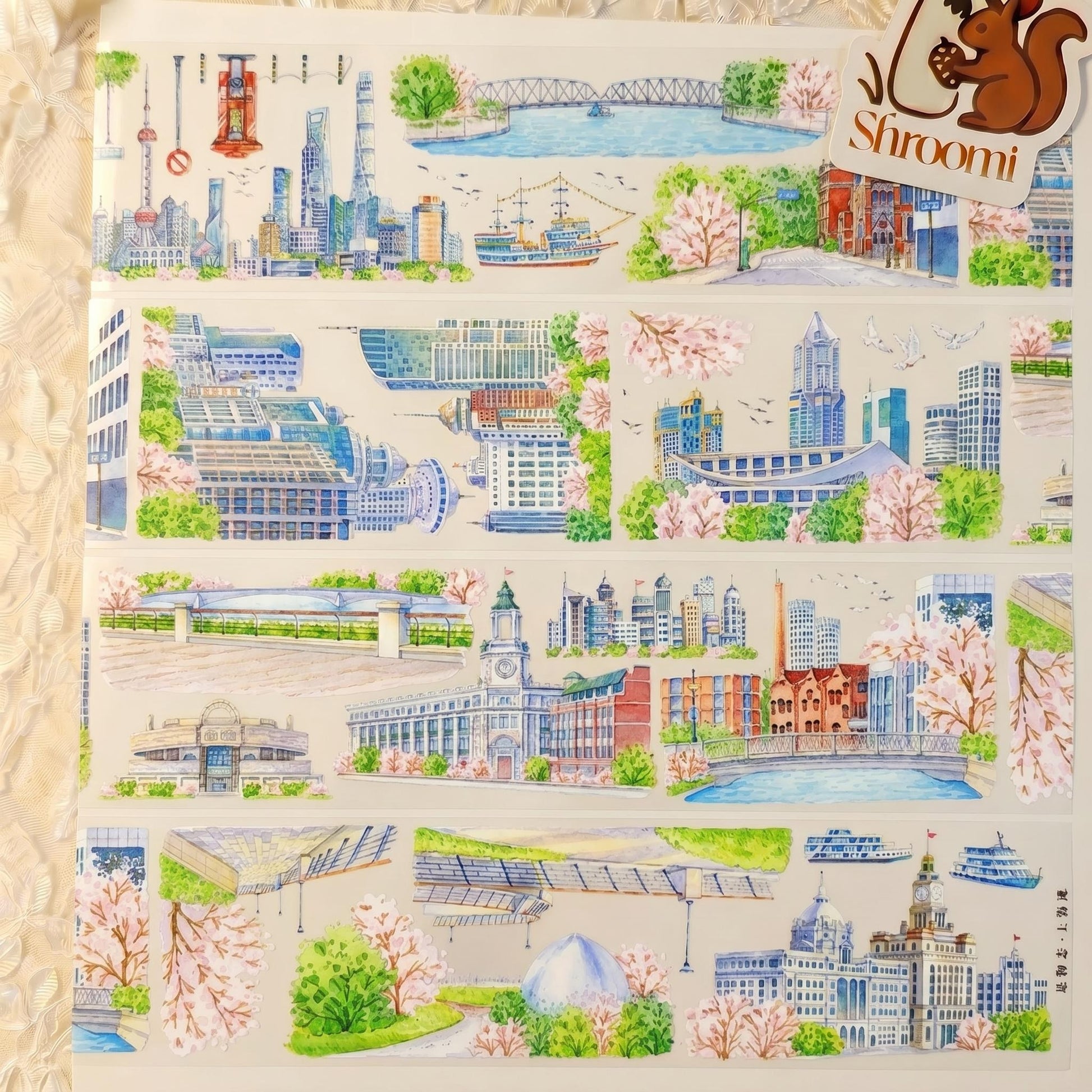 Watercolor PET tape artwork with Shanghai waterfront skyline, landmark buildings, bridges, boats, blossoms, and leafy city details