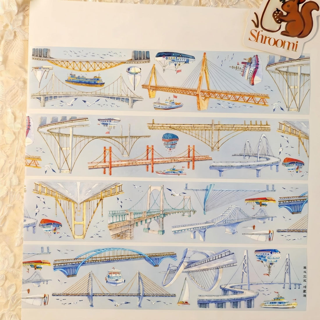 Watercolor PET tape artwork with cross-river bridges, boats, birds, and airy river scenery