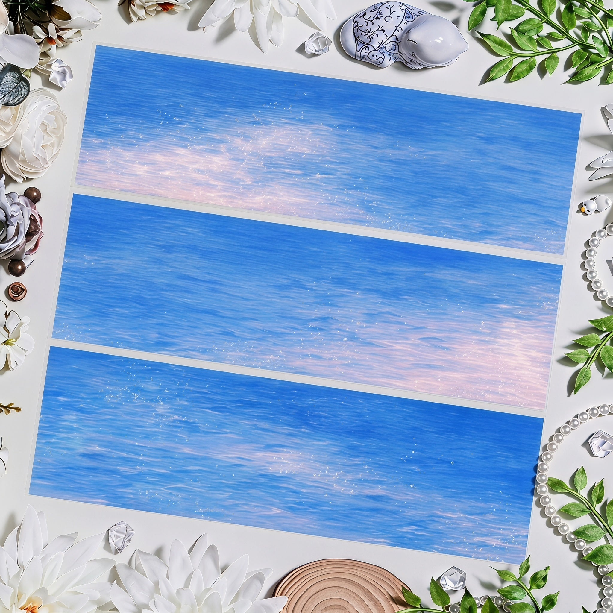Blue water decorative tape with pink sunlight reflections and sparkling waves